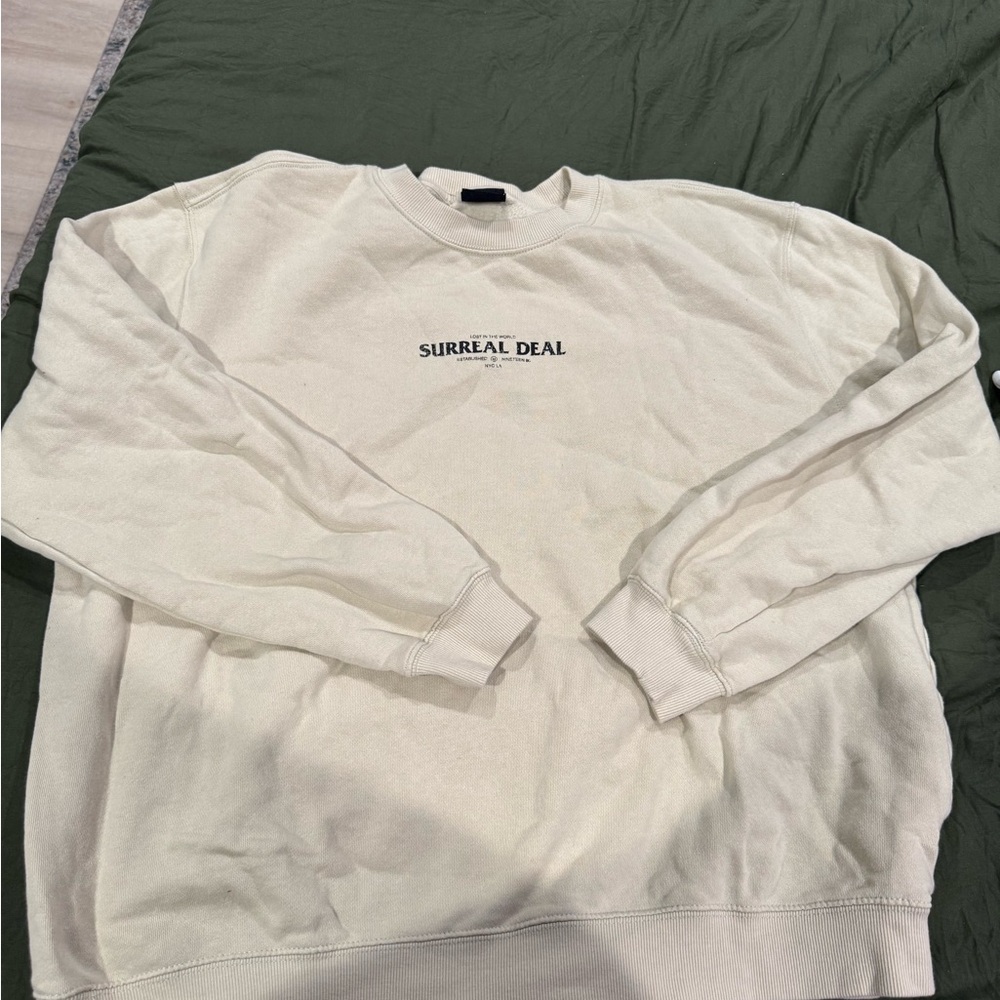 Cotton On Cream Crewneck Sweatshirt with 'Surreal Deal' Print